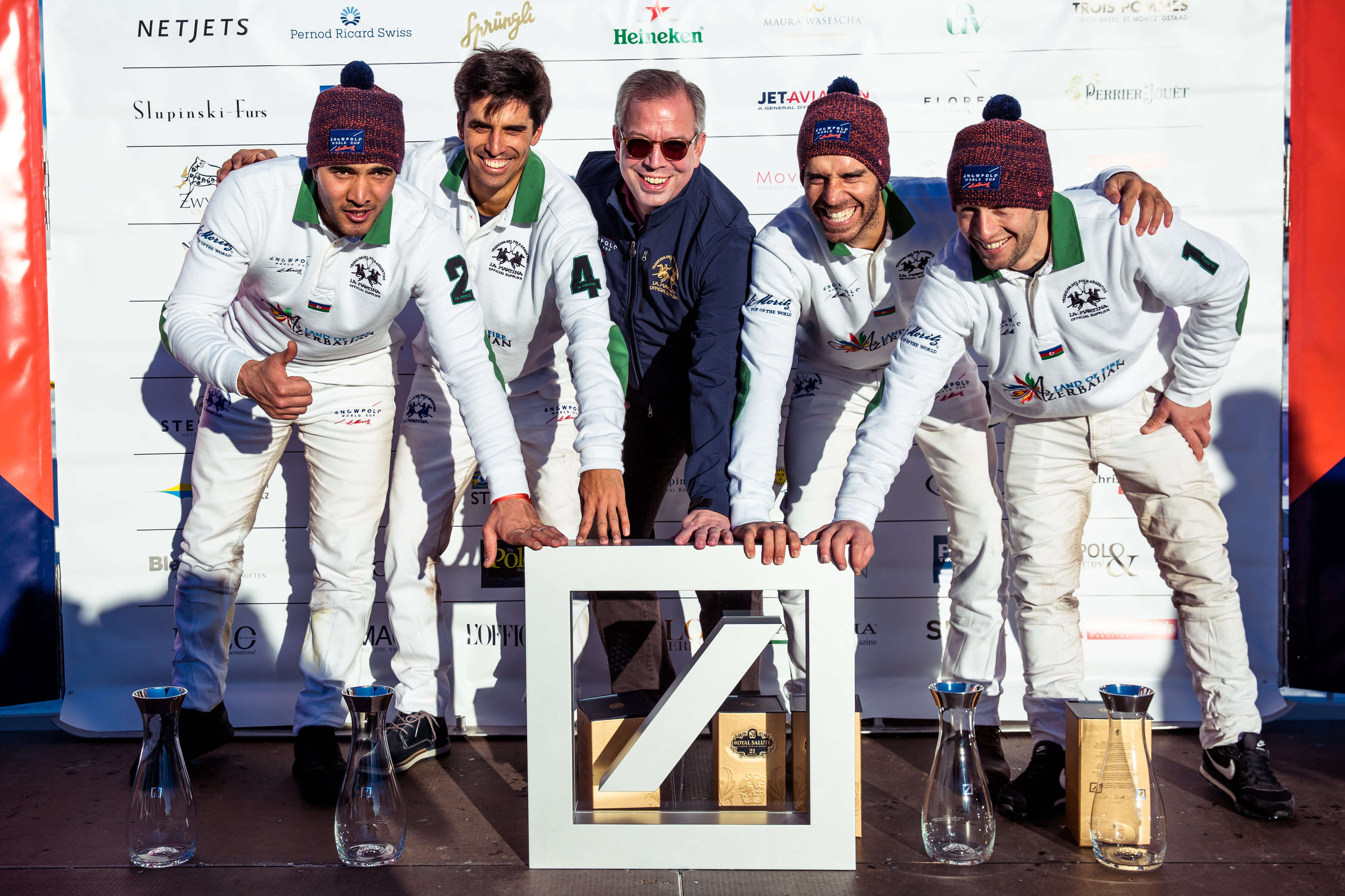 The Azerbaijan Land of Fire Snow Polo team receives the Deutsche Bank Wealth Management Challenge Cup